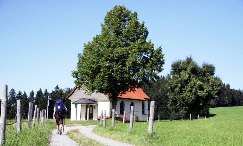 Pilgerer an der Wendelinskapelle